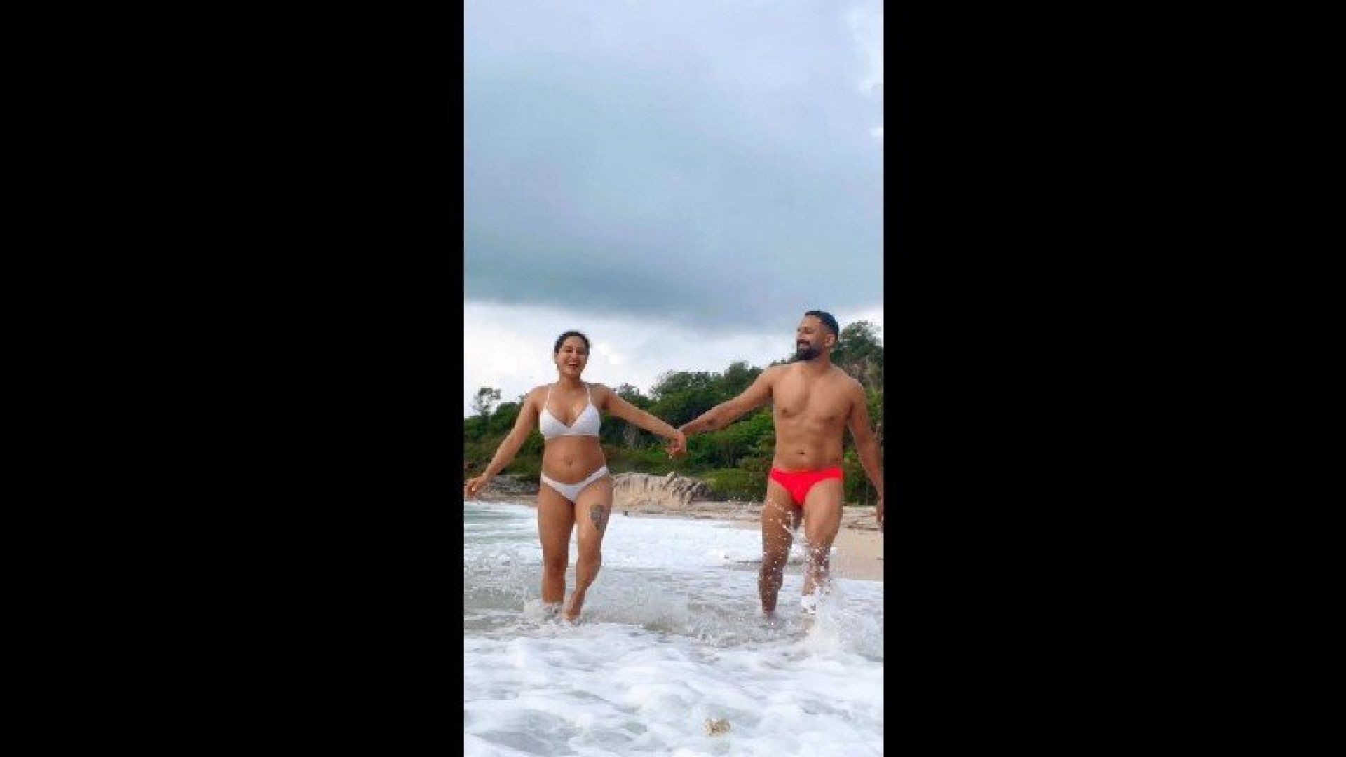 ⁣Pooja Ramachandran in bikini two piece hot